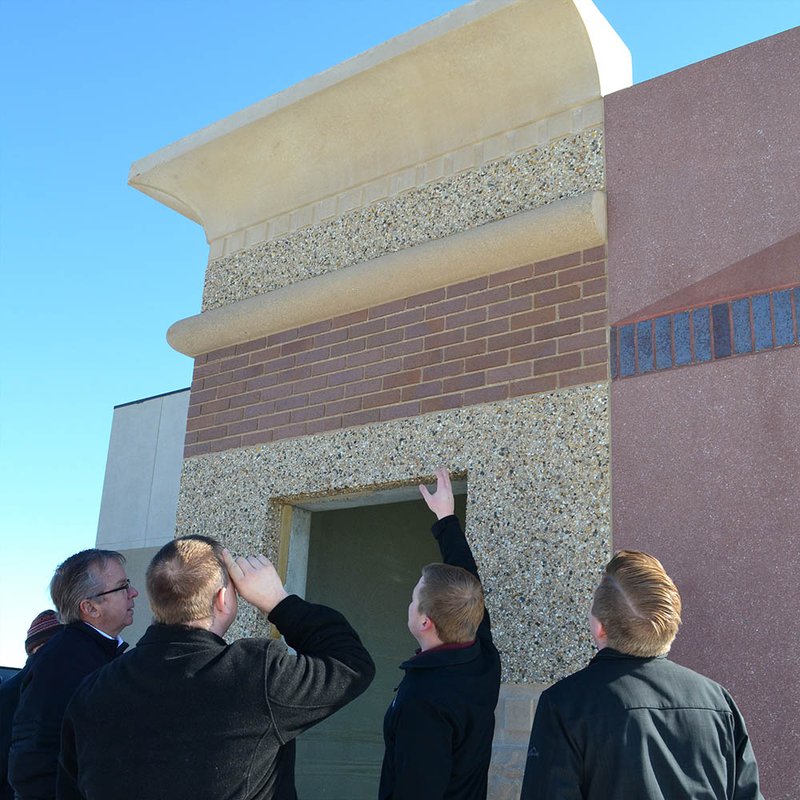 People looking at the outside of a building