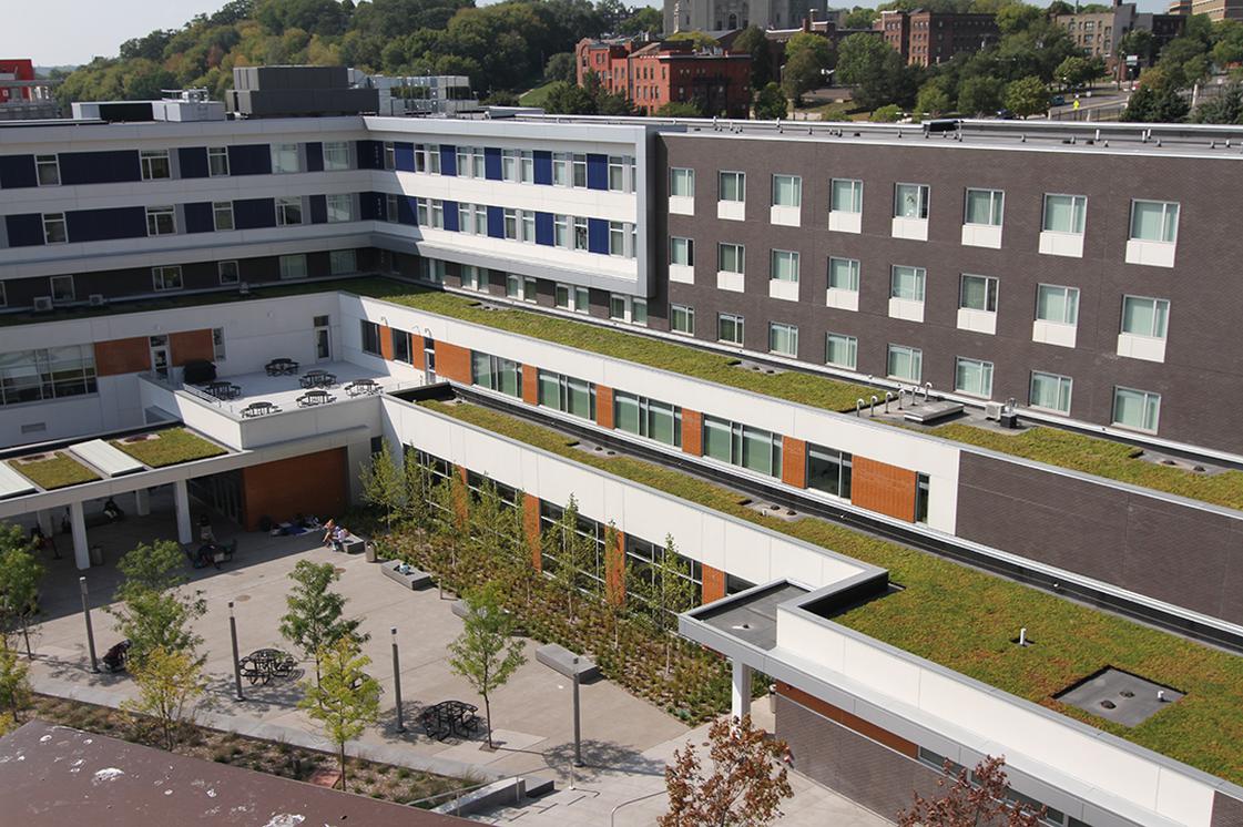 Exterior of Higher Grounds Campus St Paul - Layered building campus with greenery from above