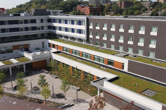Exterior of Higher Grounds Campus St Paul - Layered building campus with greenery from above
