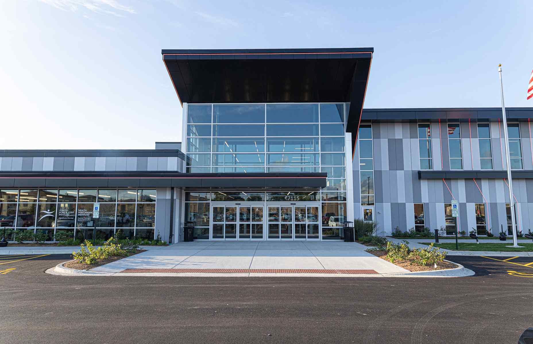 close up entrance exterior painted wall panels of rosemont ice arena