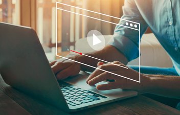 video graphic with person in front of computer