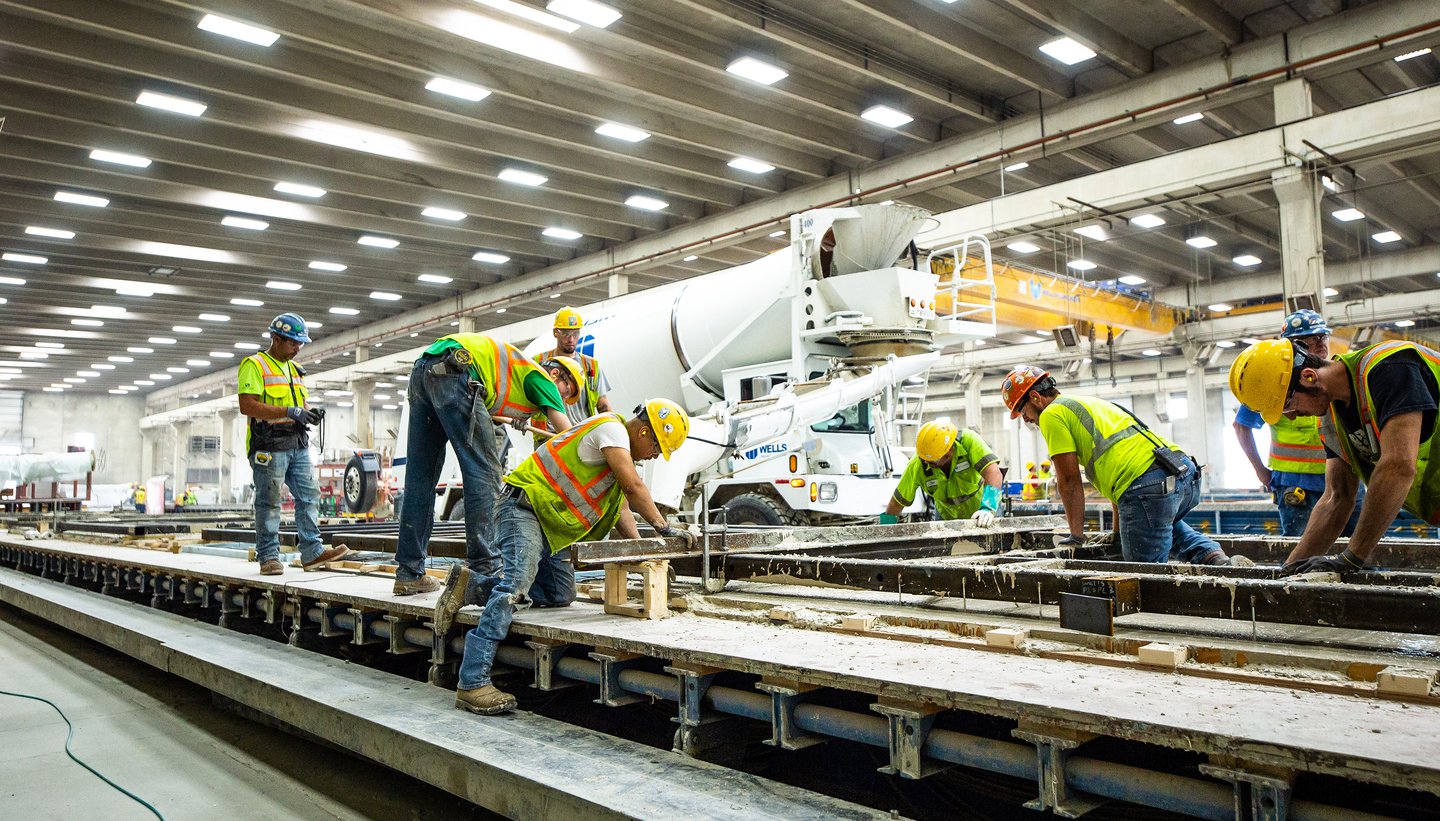 employees working in manufacturing facility