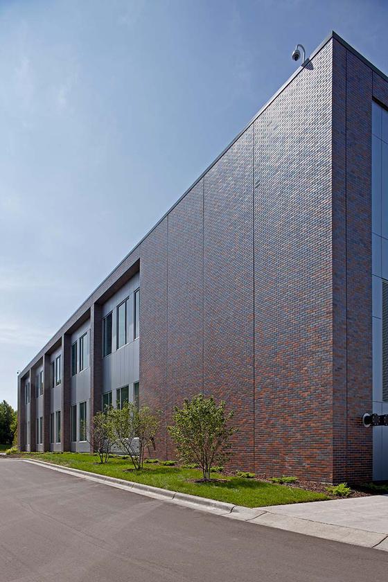 wide view of side of building with sky