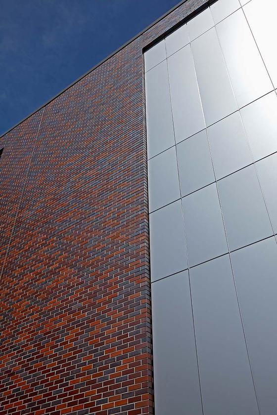 close up of side of building with sky