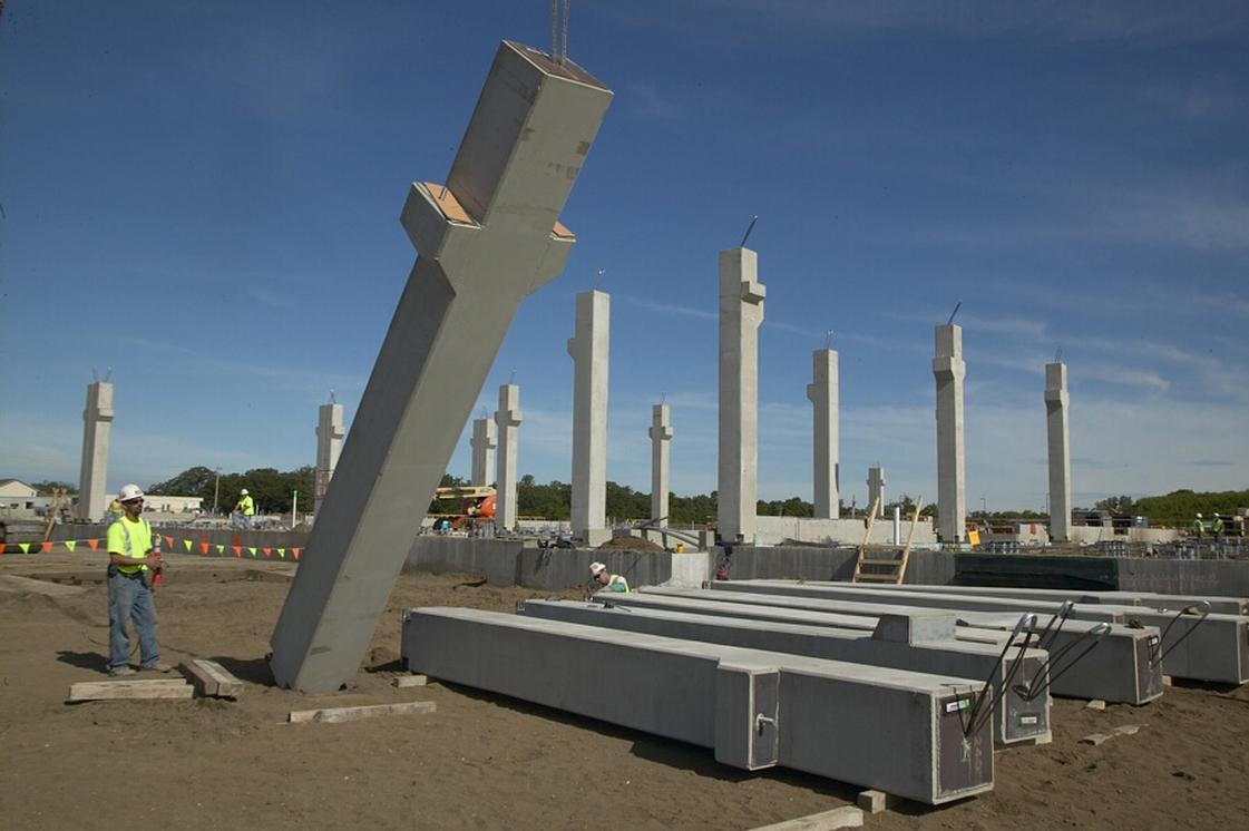 a column being lifted in a precast yard