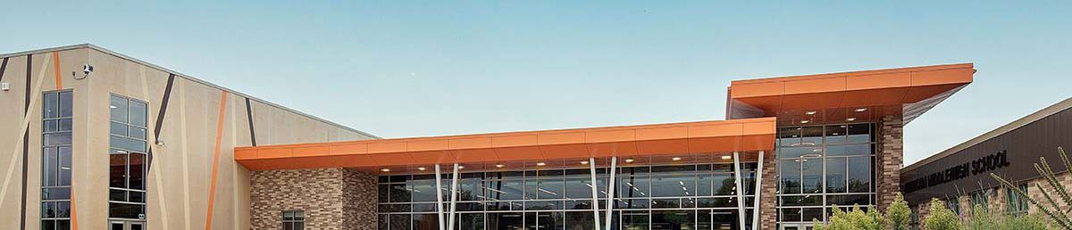 wide view of school entrance with kids