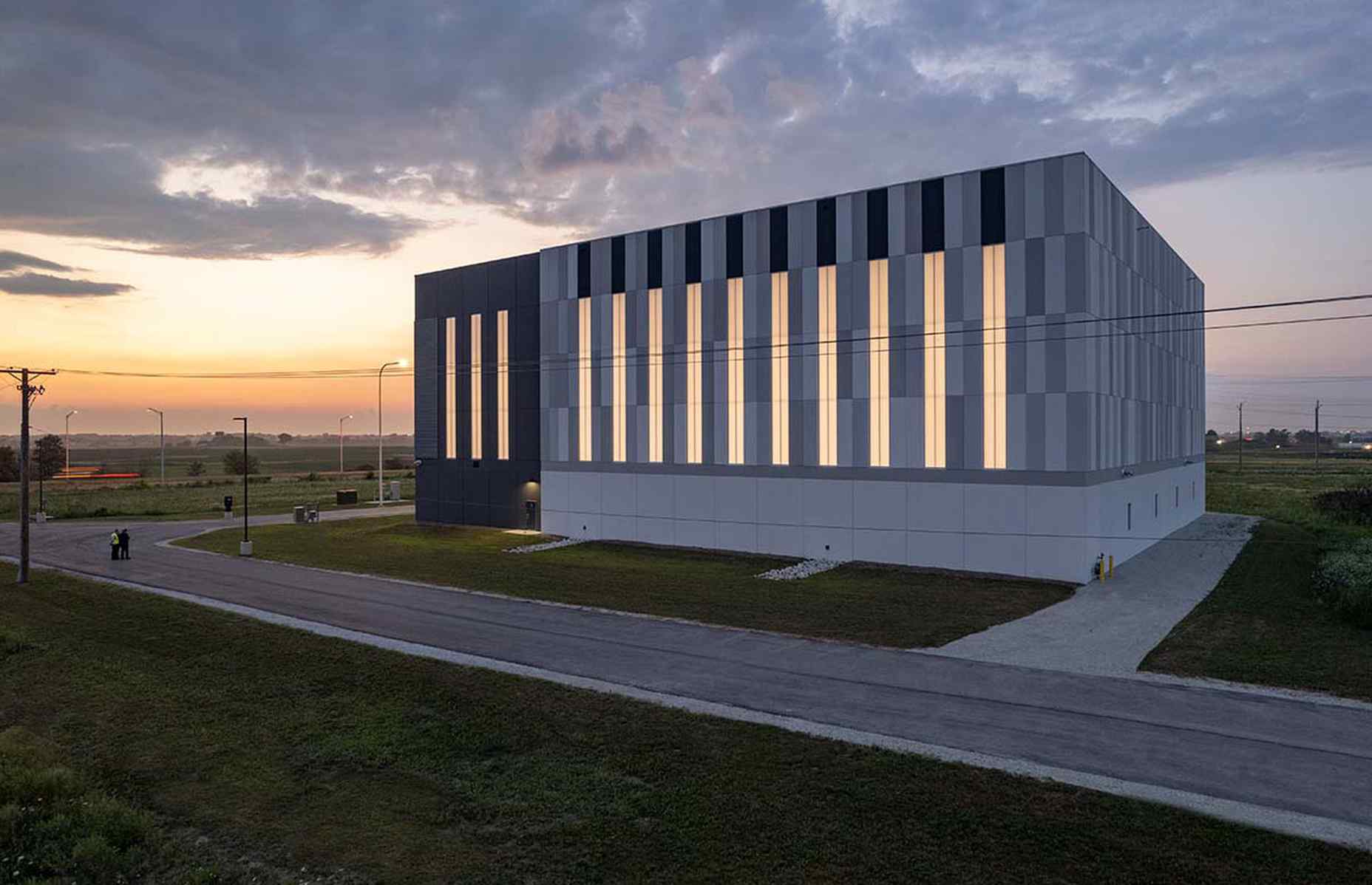 ibew training warehouse during the evening using precast architectural facades