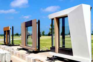 3 Infinite Facade mockup panels in a row showing various architectural designs