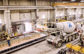 wells concrete truck pouring concrete into form