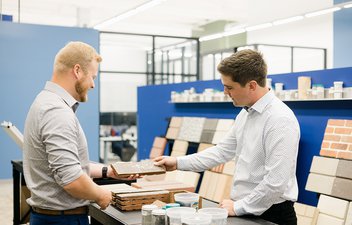 two people comparing samples