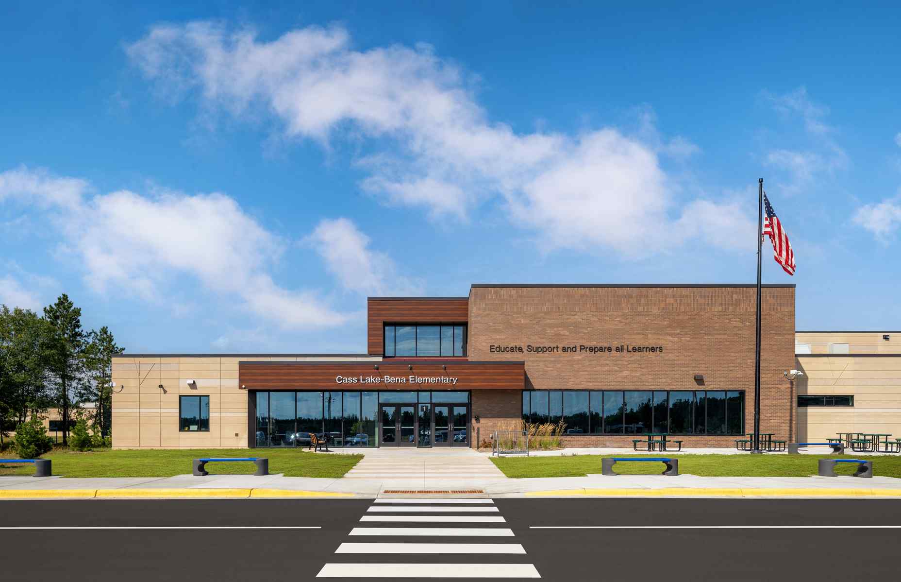 entrance exterior cass lake bena elementary with tree reveals