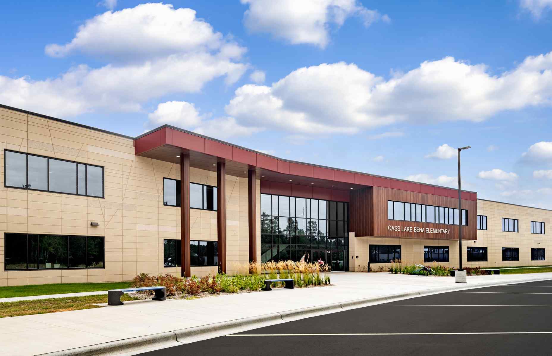 entrance close up exterior cass lake bena elementary with tree reveals