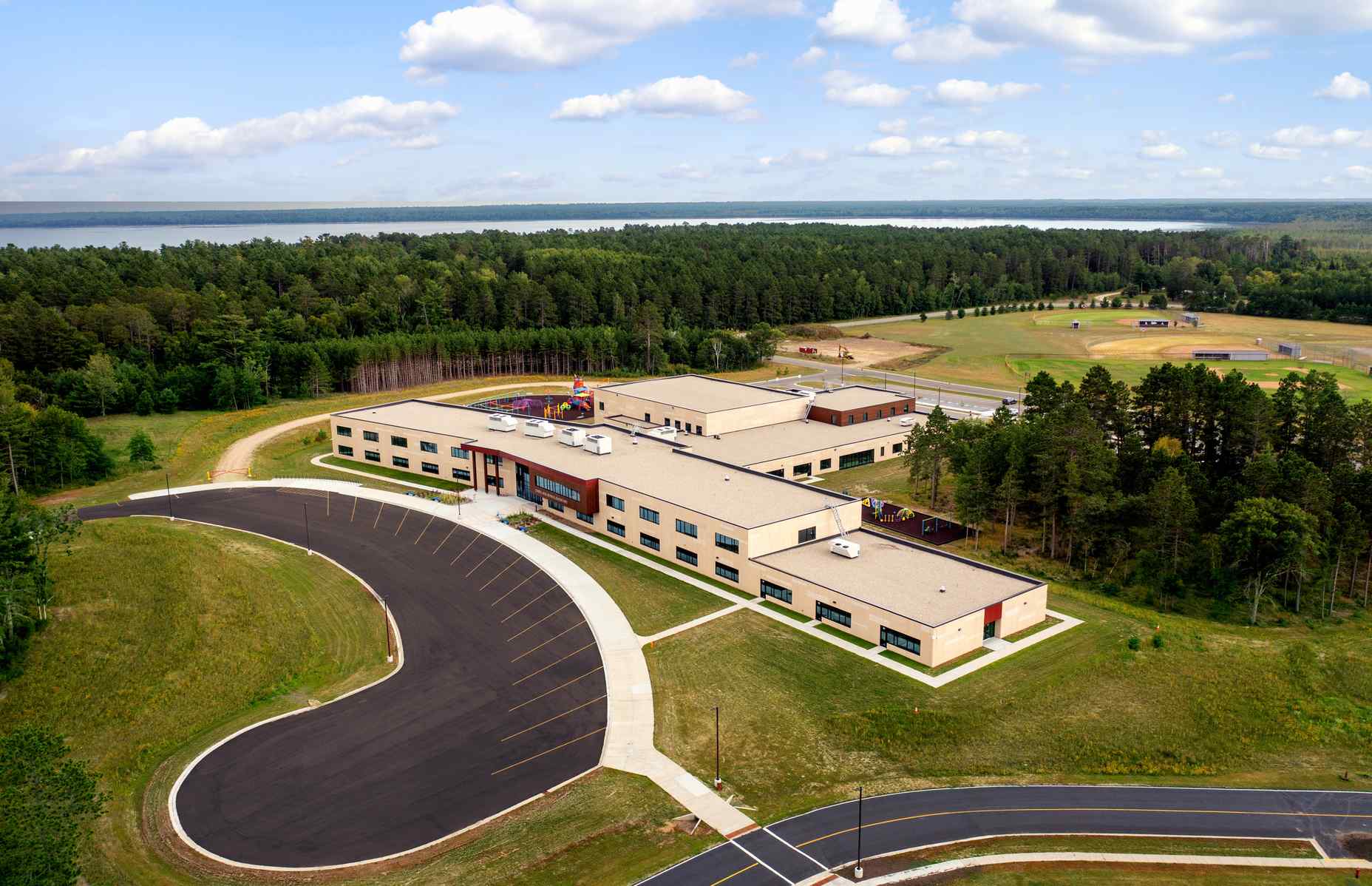 wide aerial view of cass lake bena elementary school with panel reveals