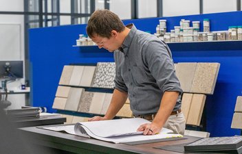 engineer looking at drafting documents