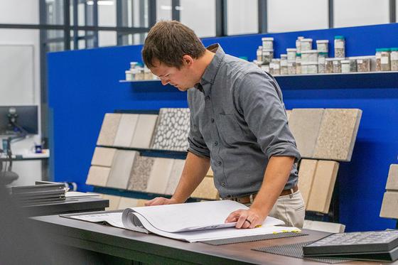 photo of engineer looking at papers