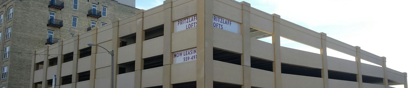 Wide shot of Prtizlaff Parking structure against a blue sky