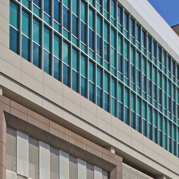 Close up view of Swedish Covenant Parking Deck with blue sky in the background