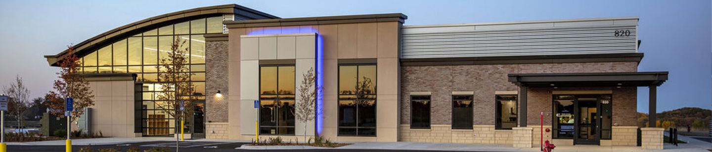 Wide shot of Twin Cities Orthopedics office at sunset