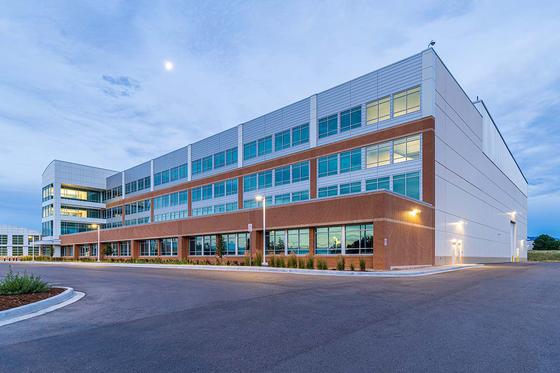 wide shot image of building with sky