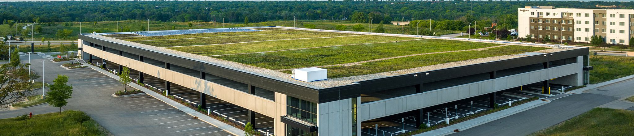 aerial view of parking deck at innovation park with grass on roof