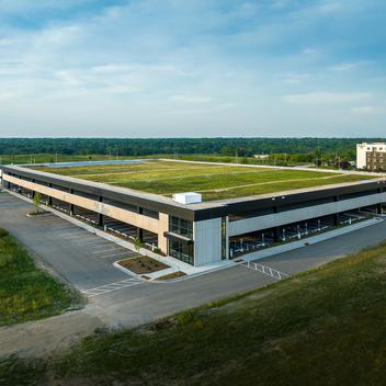 aerial view of parking deck at innovation park with grass on roof
