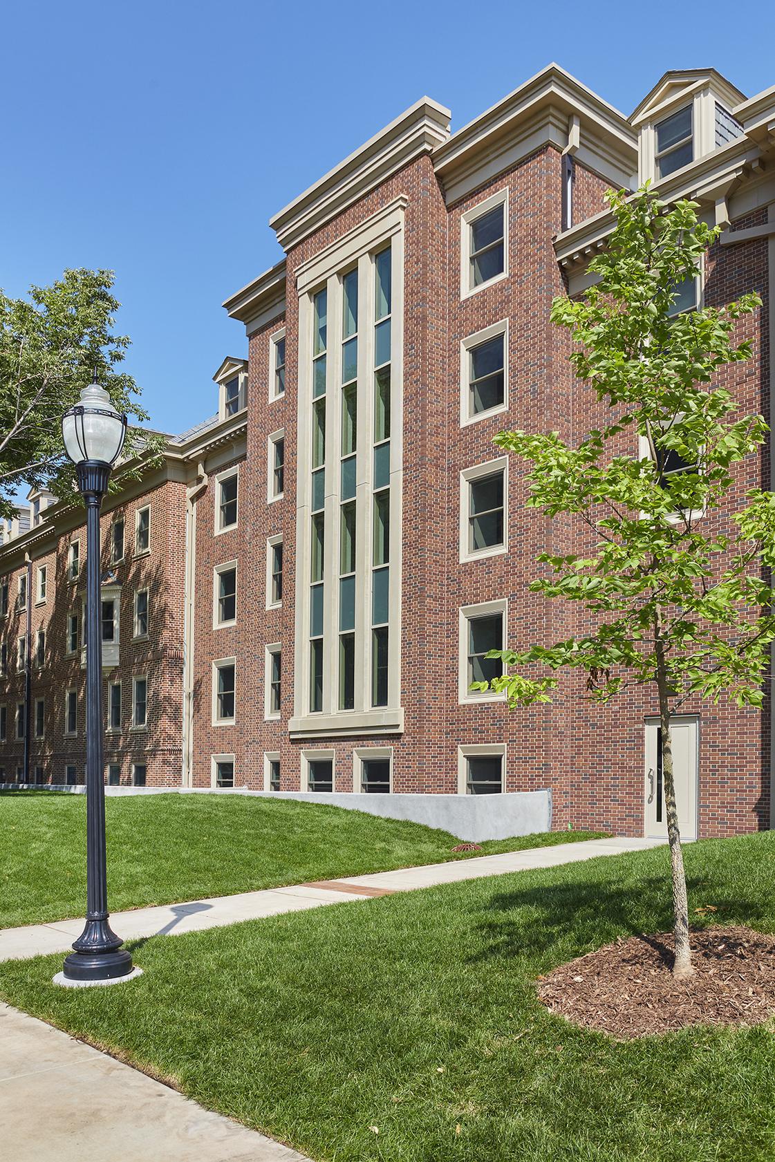 The tall windows of one part of Pioneer Hall dormitory