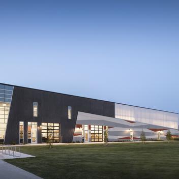 angled view of valley southwoods freshman high school CTE addition at dusk