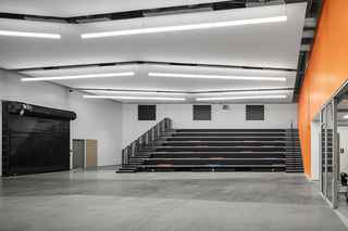interior of valley southwoods freshman high school storm shelter with safety garage doors closed