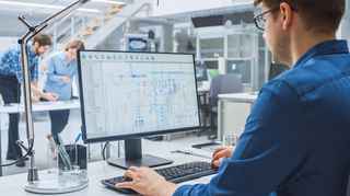Engineer working at a computer