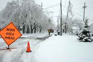 Snowy road with workers